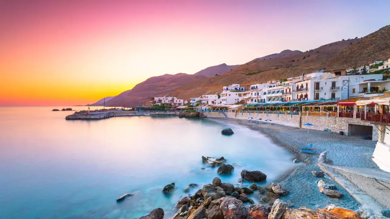 Sun setting over the town of Crete, Greece