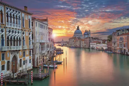 Sunset photo over the canal in Venice, Italy