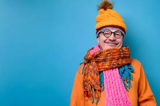 older man bundled up in winter clothing