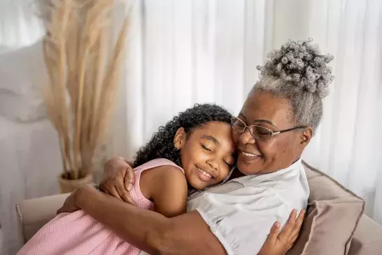 Grandmother advising granddaughter stock photo