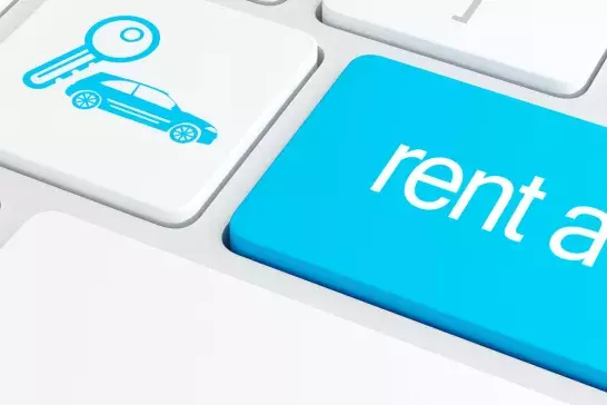 keyboard with "rent a car" on key