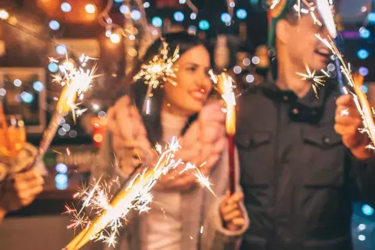 People celebrating with sparklers