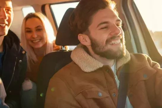 Friends in car driving