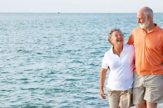 Seniors Walking on the Beach 