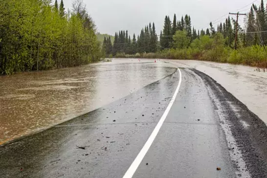 Road is flooded, always there for Emergency Roadside Assistance