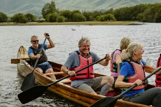 Travellers rowing in England, Europe along the river 