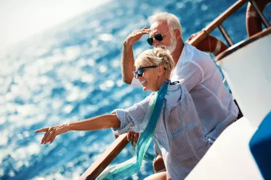 Senior couple on a sailing cruise