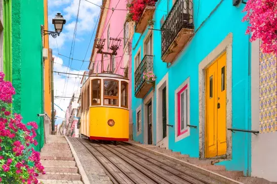 Yellow typical tram in Lisbon, Portugal