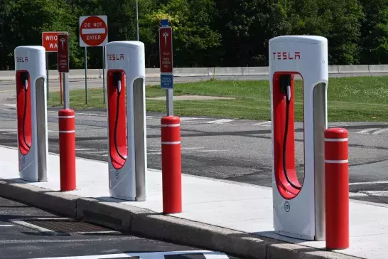 Three Tesla electric vehicle charging stations