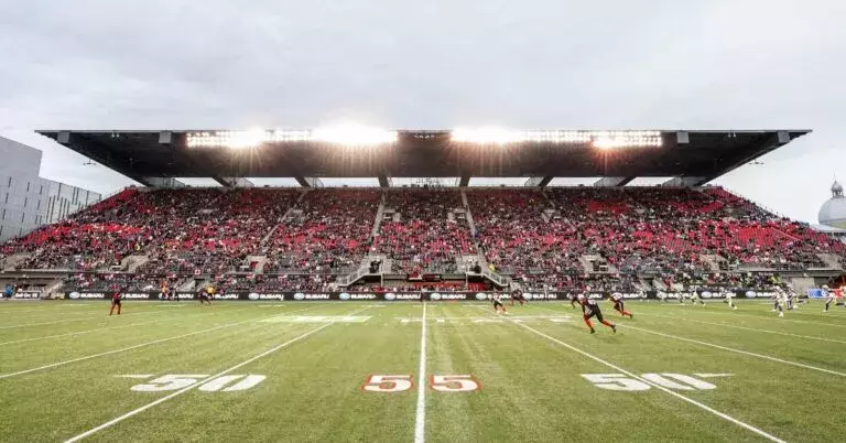 the 55 yardline of an outdoor foot ball field