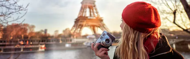 Woman taking photos in France 