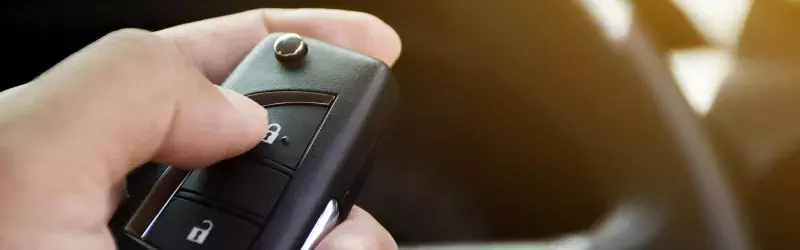 Holding a Car Fob Key