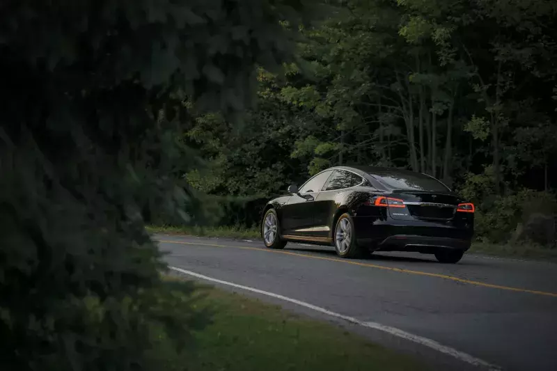 A Car running on the mountain road