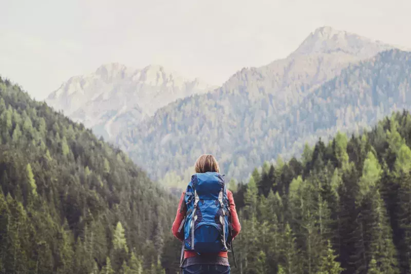 Young woman traveler in a mountains