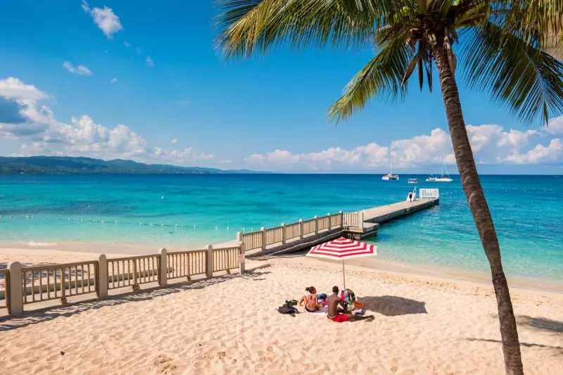 Family at Doctor's Cave Beach in Montego Bay Jamaica