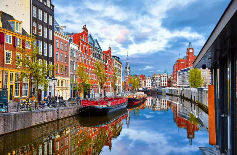 Channel in Amsterdam Netherlands houses river Amstel