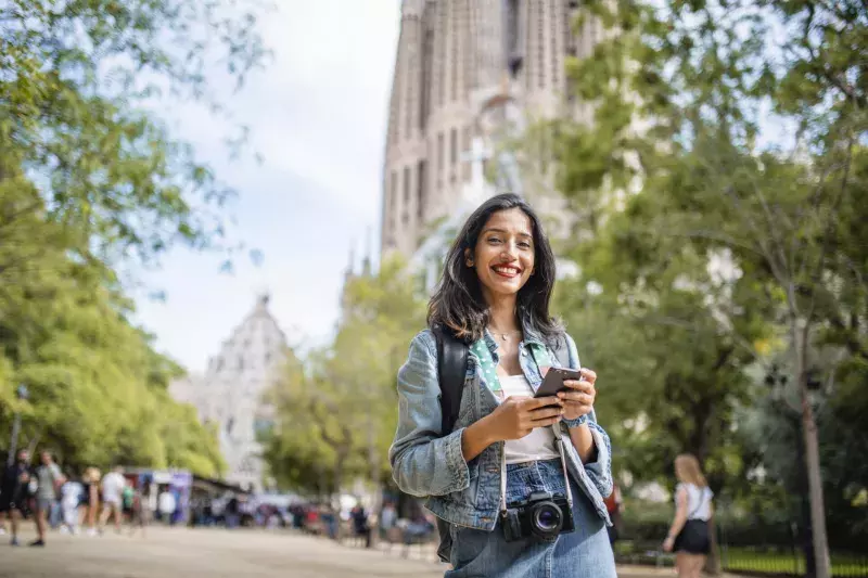 Candid Portrait of Relaxed Female Tourist in Barcelona