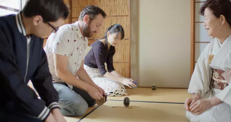 Guests Being Instructed at Japanese Traditional Tea Ceremony