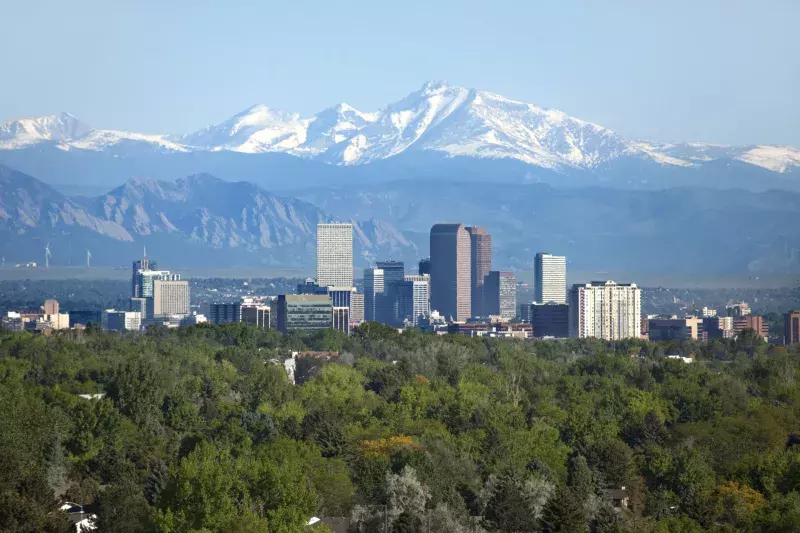 Denver Colorado skyscrapers snowy Longs Peak Rocky Mountains summer