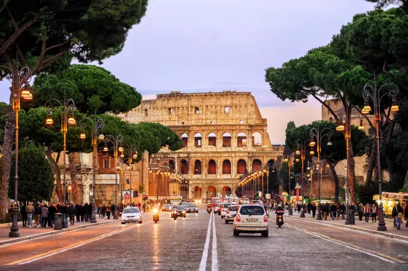 Traffic street in front of Colosseum, Rome, Italy